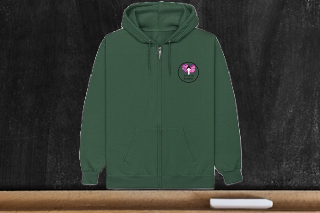 green zip up hoodie with wall clock displaying a stack of pink books with the words: Adventure, fun, and imagination at the 12 position. 
the phrase, 
